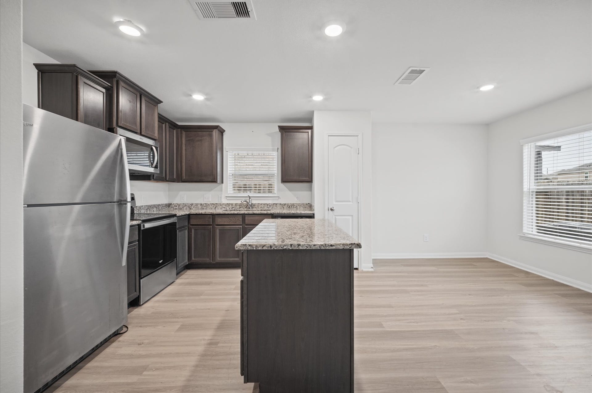 327 Spanish Stone Drive, Katy, TX 77493 Large kitchen and breakfast nook area.