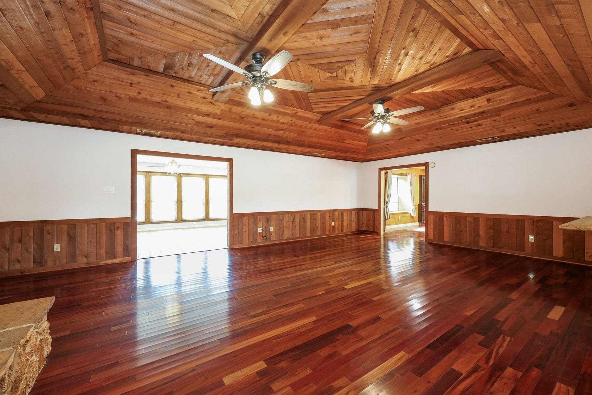22107 Rosewood Trail, Tomball, TX 77377 Large Family Room with a Beautiful Wood Ceiling and a Stone-Faced Wood-Burning Fireplace.