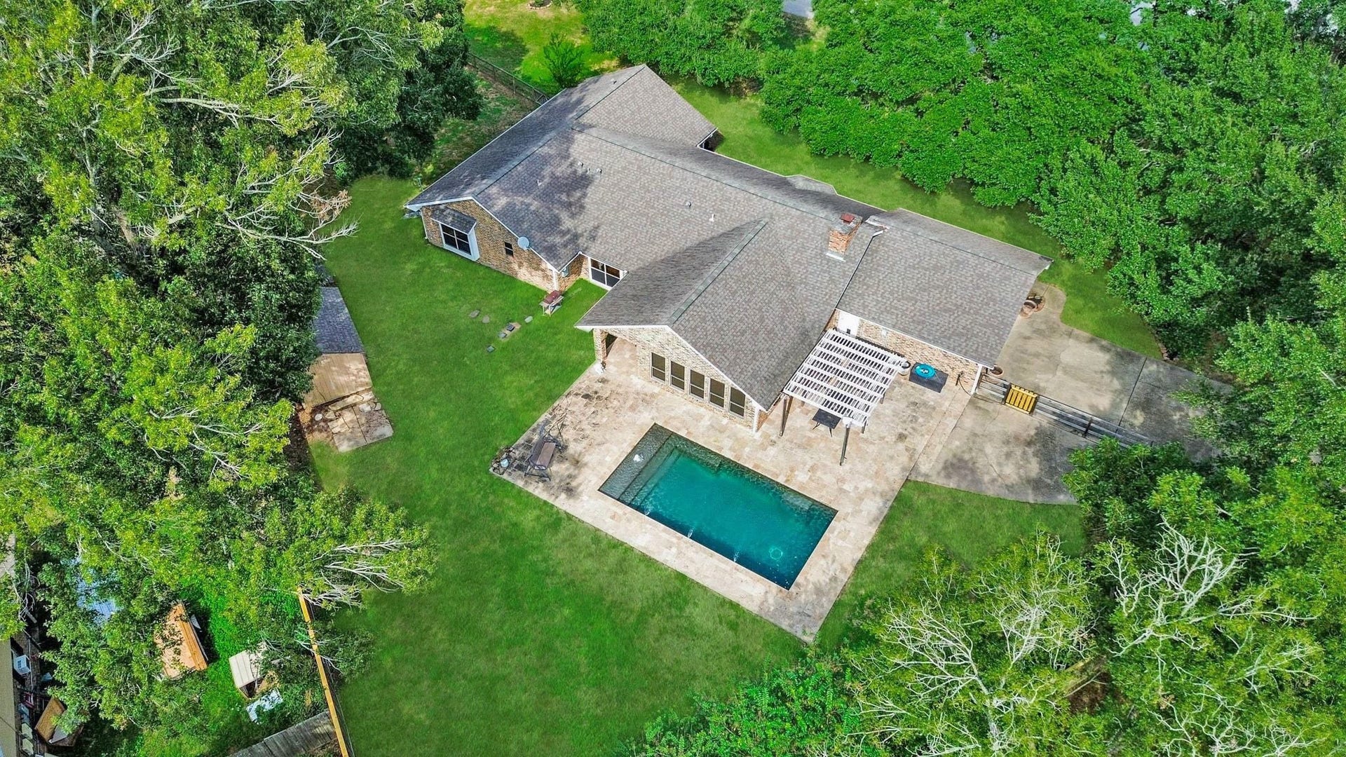 22107 Rosewood Trail, Tomball, TX 77377 Aerial View of the Home which is Across the Street from the Beautiful Neighborhood Lake with Island.
