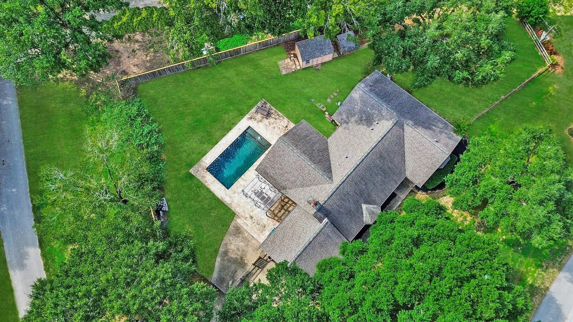 22107 Rosewood Trail, Tomball, TX 77377 Aerial View of the Home which is Across the Street from the Beautiful Neighborhood Lake with Island.