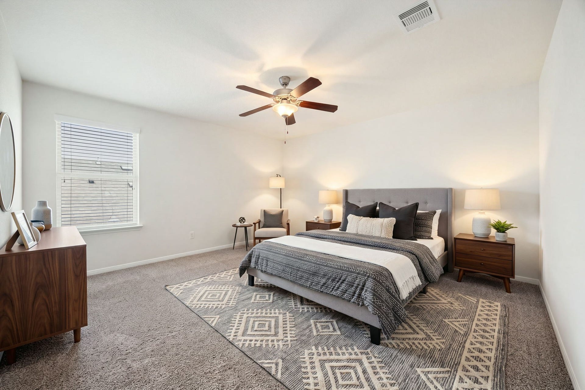 23643 Balzano Court, Katy, TX 77493 Quiet secondary bedroom space featuring a functional layout, plush wall-to-wall carpeting, and a central ceiling fan fixture