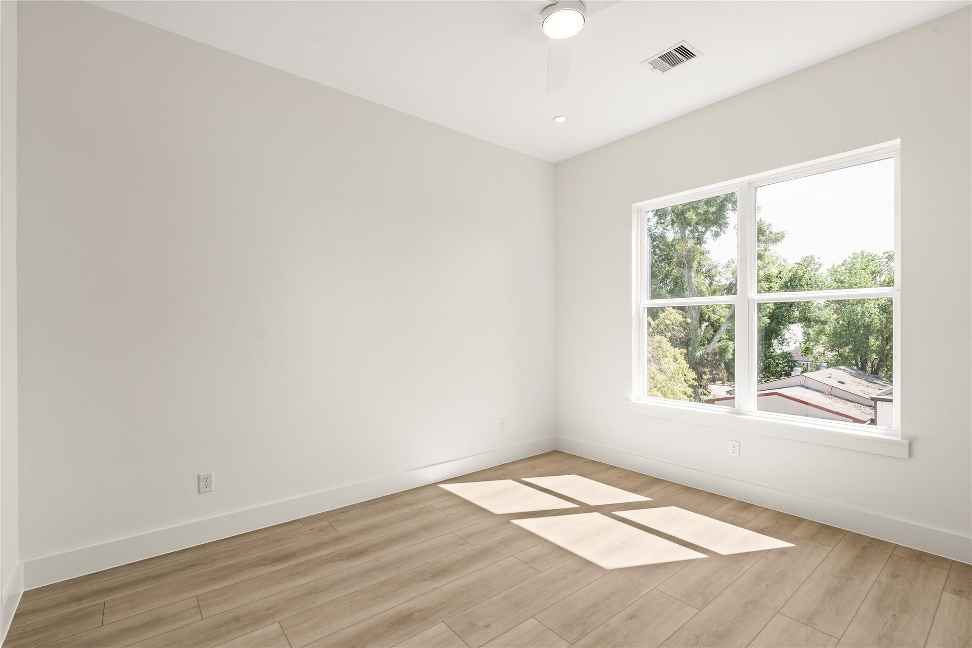 Third upstairs bedroom. Big window on the side wall, so the sun comes in all afternoon.