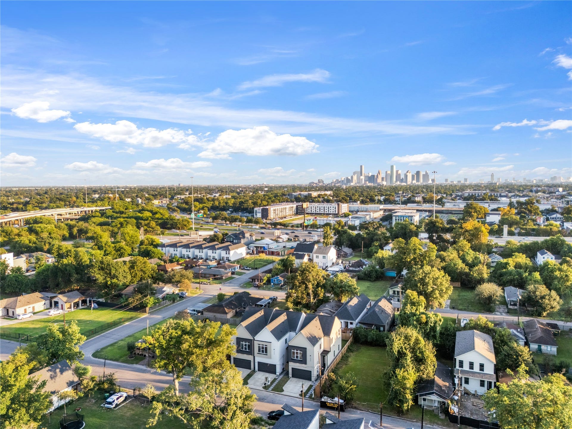 33rd is one of the widest streets in Independence Heights, so guests actually have somewhere to park. New construction is mixing in all around it.