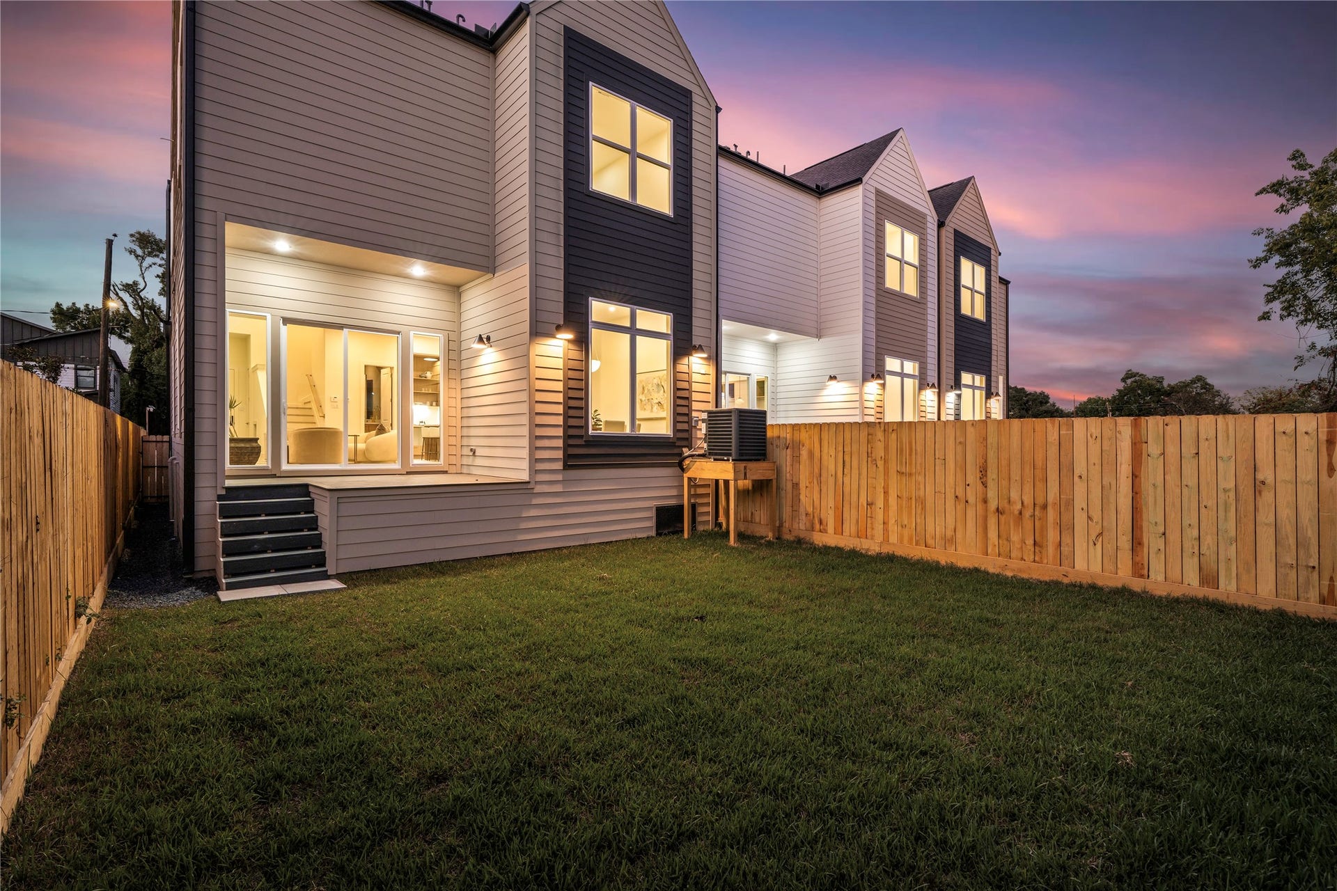Covered patio and a fenced backyard that runs deeper than the standard new build in the neighborhood. Sod in, fence up, ready for a dog.
