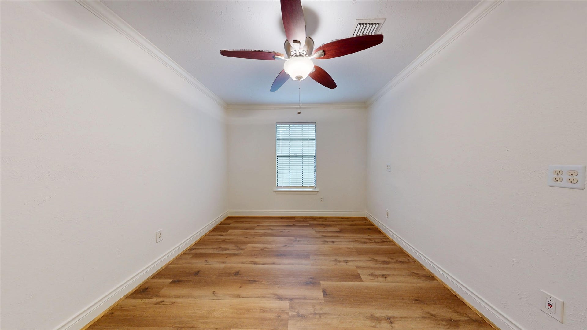 Comfortable secondary bedroom with ample space and a welcoming feel.