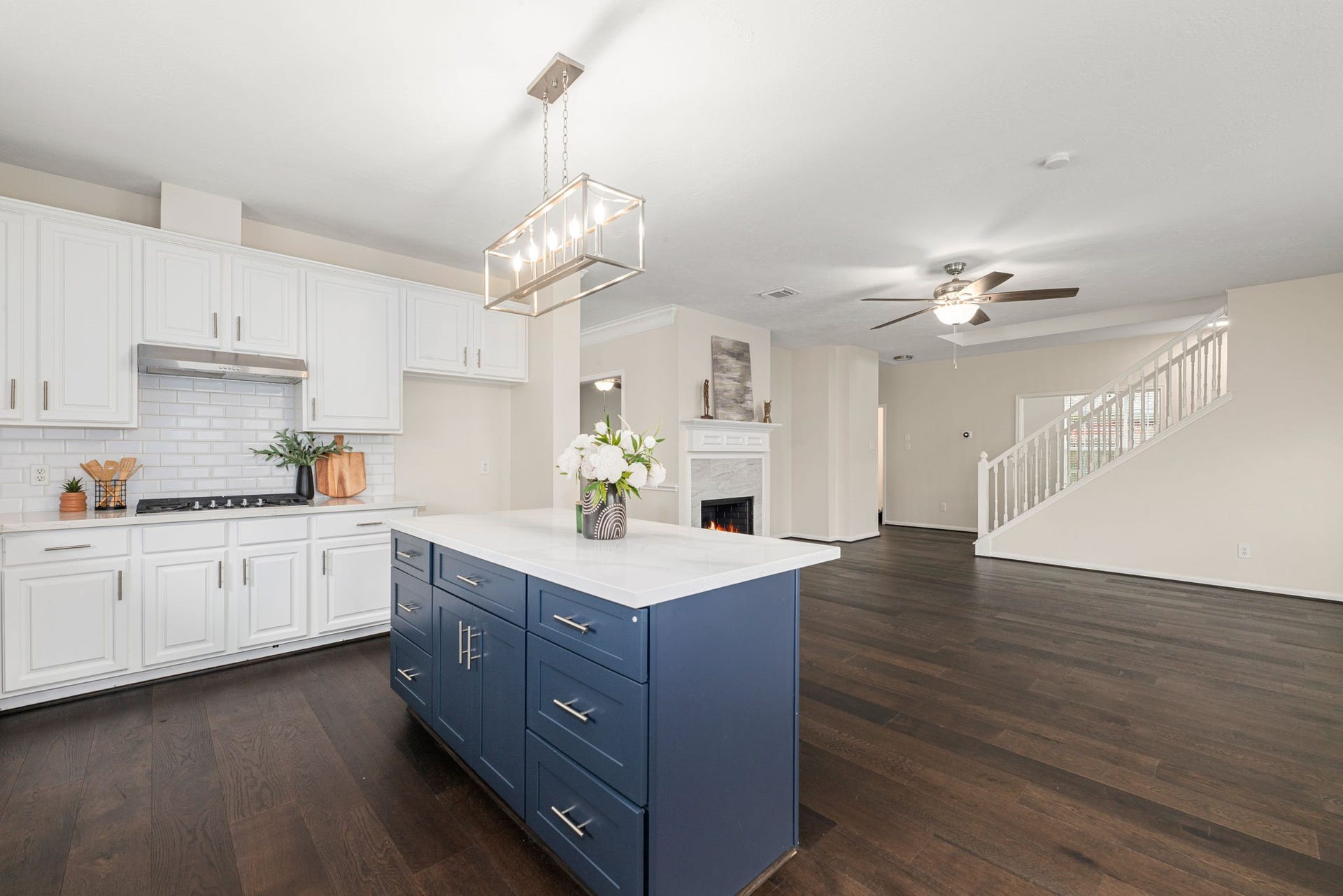 5507 River Gable Court, Sugar Land, TX 77479 Open-concept design seamlessly connects living, dining, and kitchen for everyday living and entertaining.