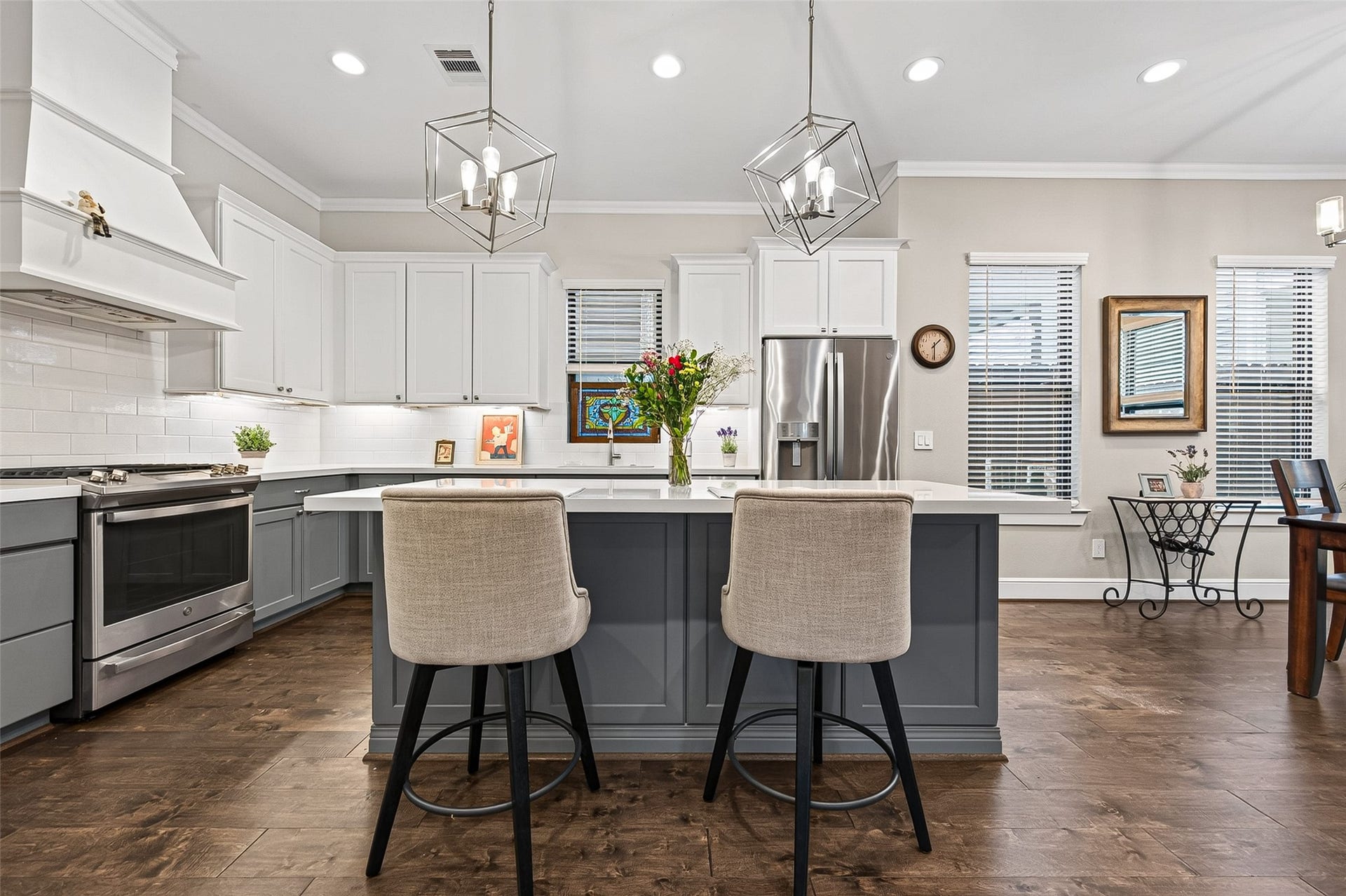 3508 Harvest Dance Drive, Houston, TX 77008 Plenty of recessed lighting in the home with dimmer switches throughout. The engineered hardwood flooring provides an attractive contrast to the wall and cabinet colors.