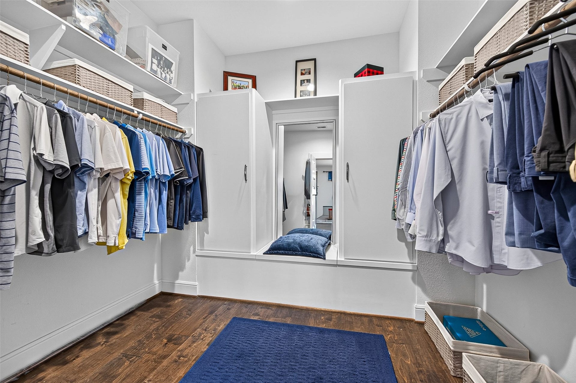 3508 Harvest Dance Drive, Houston, TX 77008 The Primary Closet is oversized with double shelving on top plus storage on either side of the mirror with a top shelf. BONUS - The owner added a Seasonal Storage Door below the mirror.