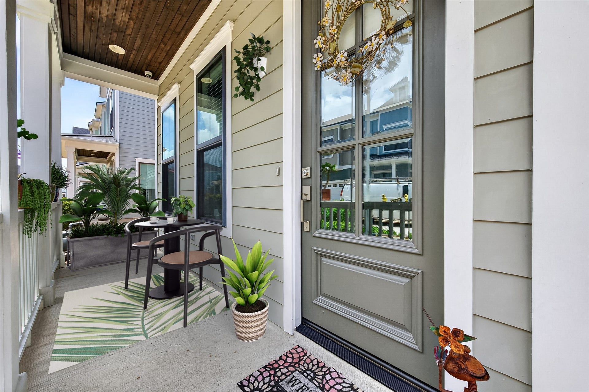 3508 Harvest Dance Drive, Houston, TX 77008 What a difference a little bit of design makes in this virtually-staged covered porch.