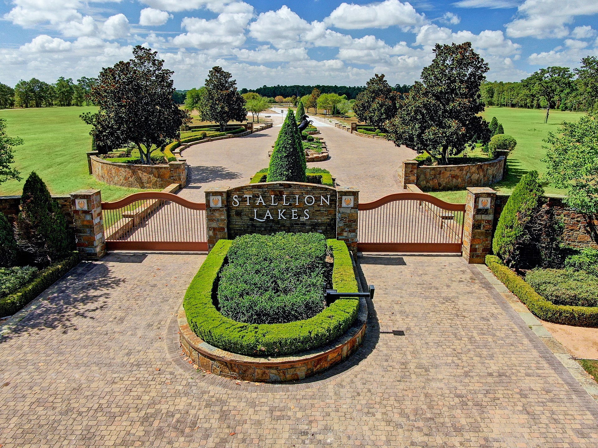 Aerial view of the entrance to the Stallion Lakes community.