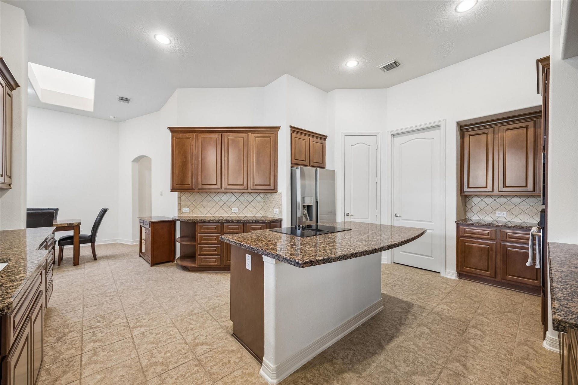 4703 Stonepass Court, Sugar Land, TX 77479 Island with cooktop!