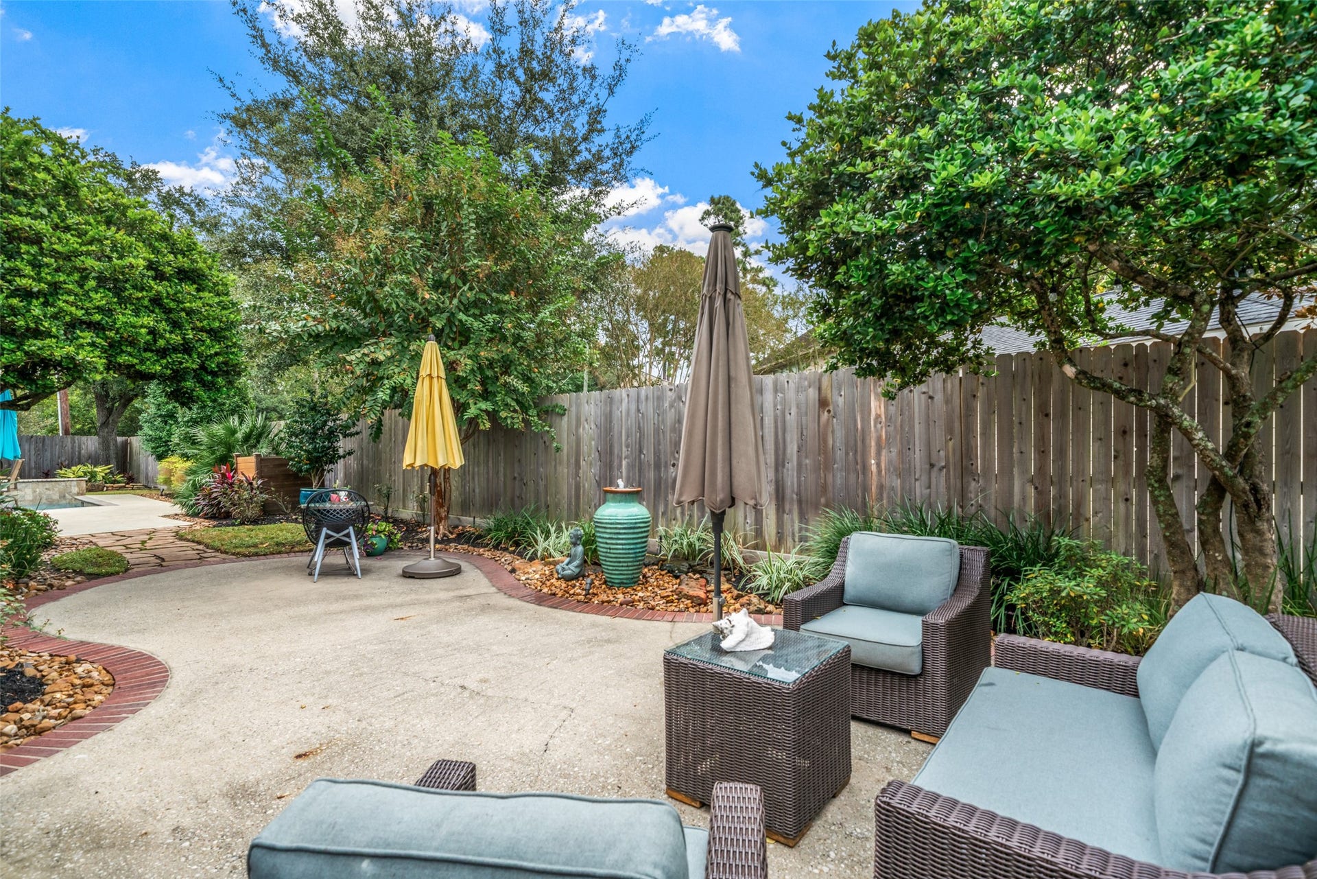 3507 Aspen Glen Lane, Spring, TX 77388 The perfect spot for your morning coffee or tea. The outdoor couch and chairs are included. Some pots are excluded.