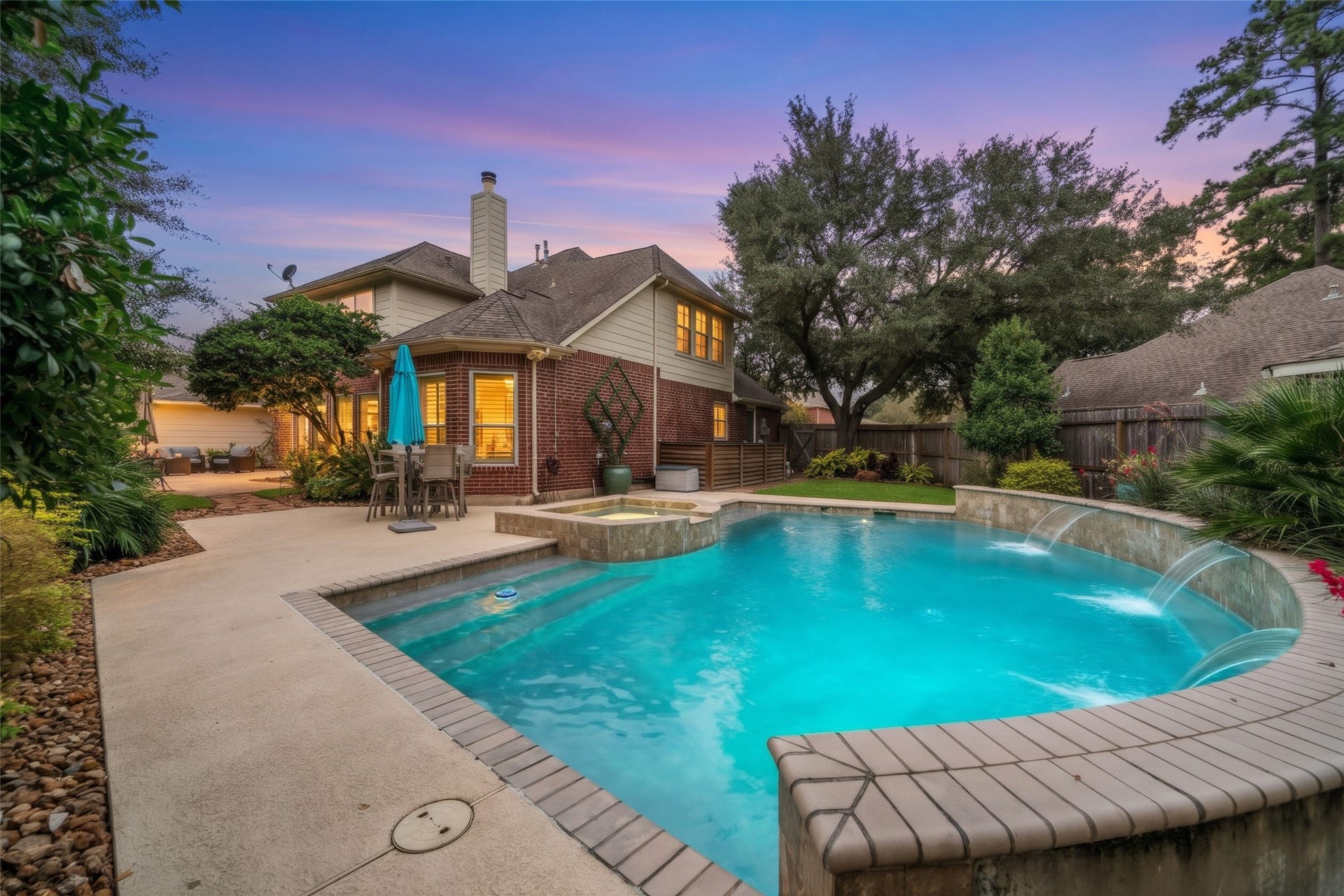 3507 Aspen Glen Lane, Spring, TX 77388 Inviting pool lighting for a nighttime swim on those fun summer nights.