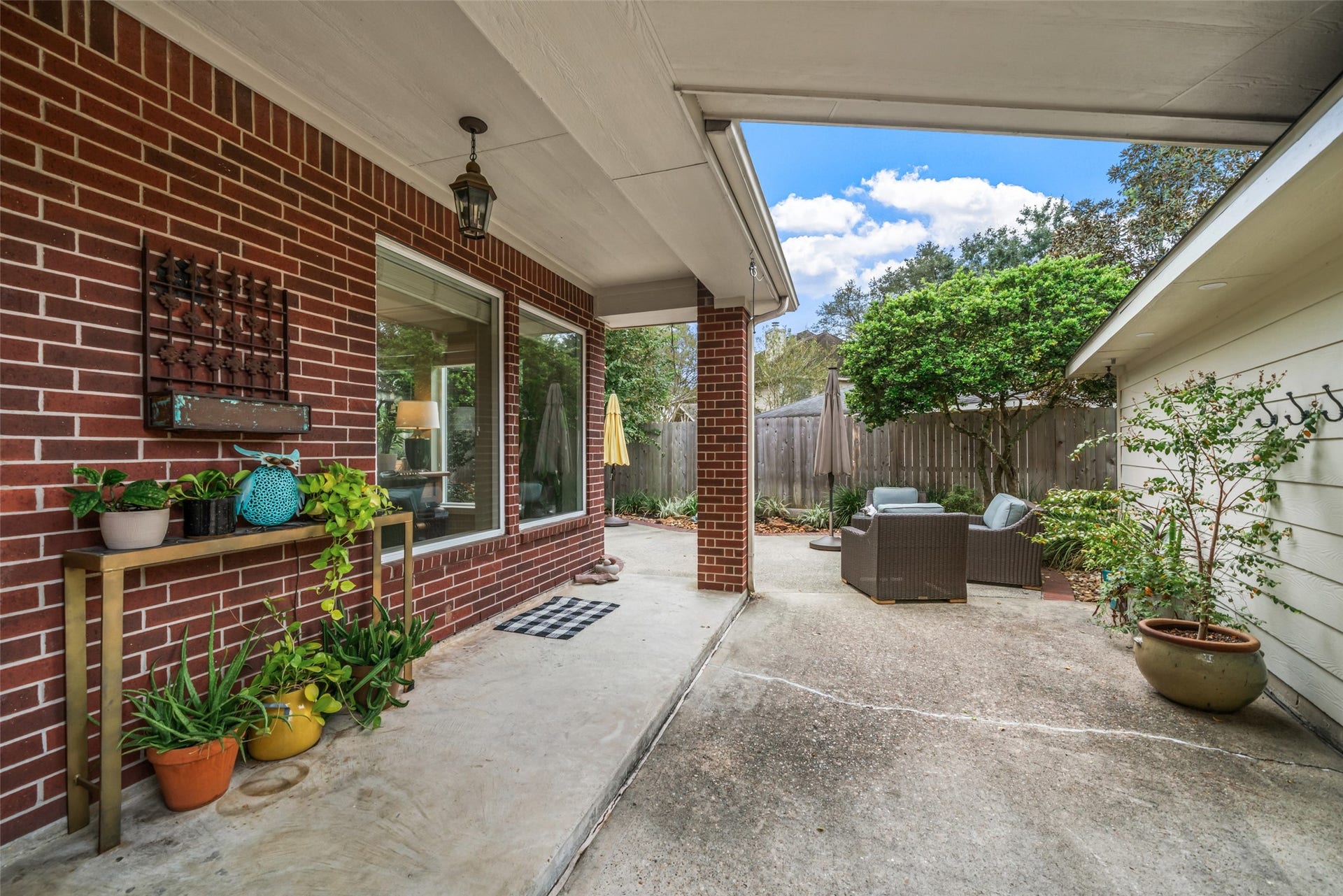 3507 Aspen Glen Lane, Spring, TX 77388 This is the backdoor view from the kitchen. The covered walkway connects the garage and leads to the outdoor oasis.