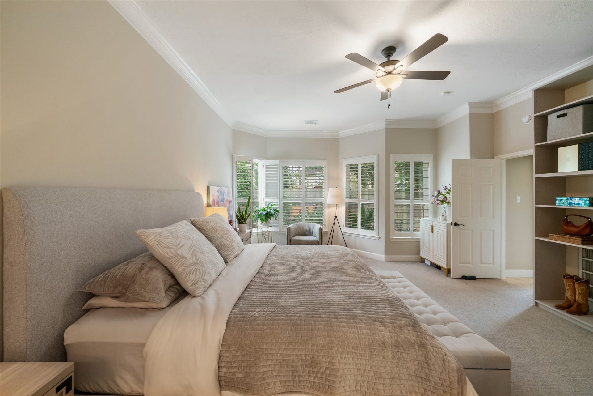 3507 Aspen Glen Lane, Spring, TX 77388 Additional space in the primary for sitting. Open the shutters for a pool view. Lucious landscaping gives the privacy everyone is asking for in a backyard.