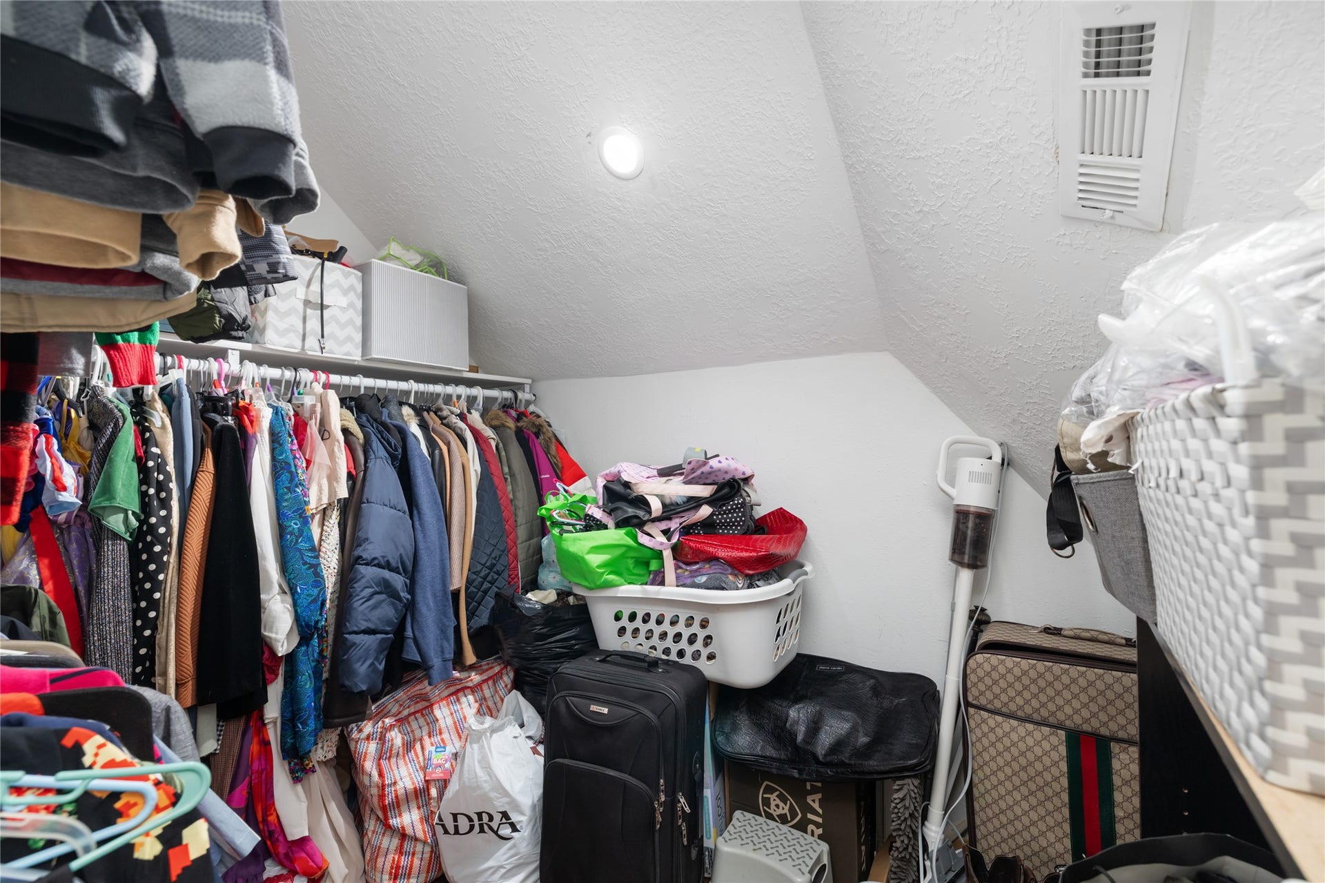 2603 Grape Lane, Pasadena, TX 77502 Additional closet spaces added in attic areas, perfect for holiday storage.