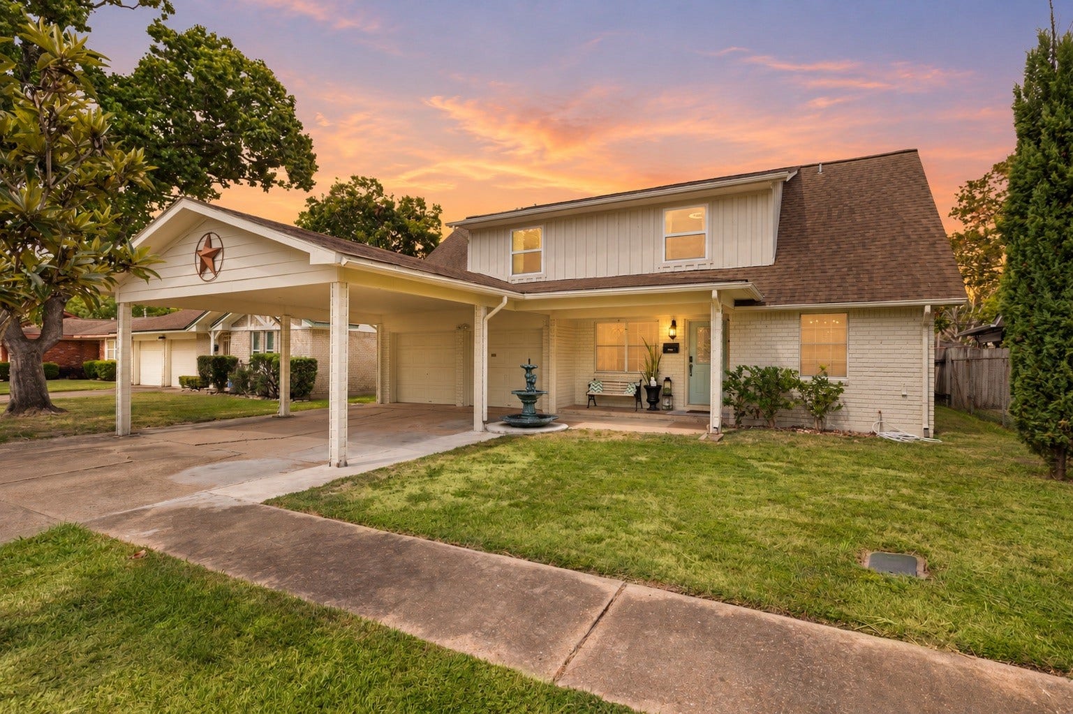 2603 Grape Lane, Pasadena, TX 77502 Additional parking in the extended carport. Holds four vehicles. (Sky Virtually Enhanced)
