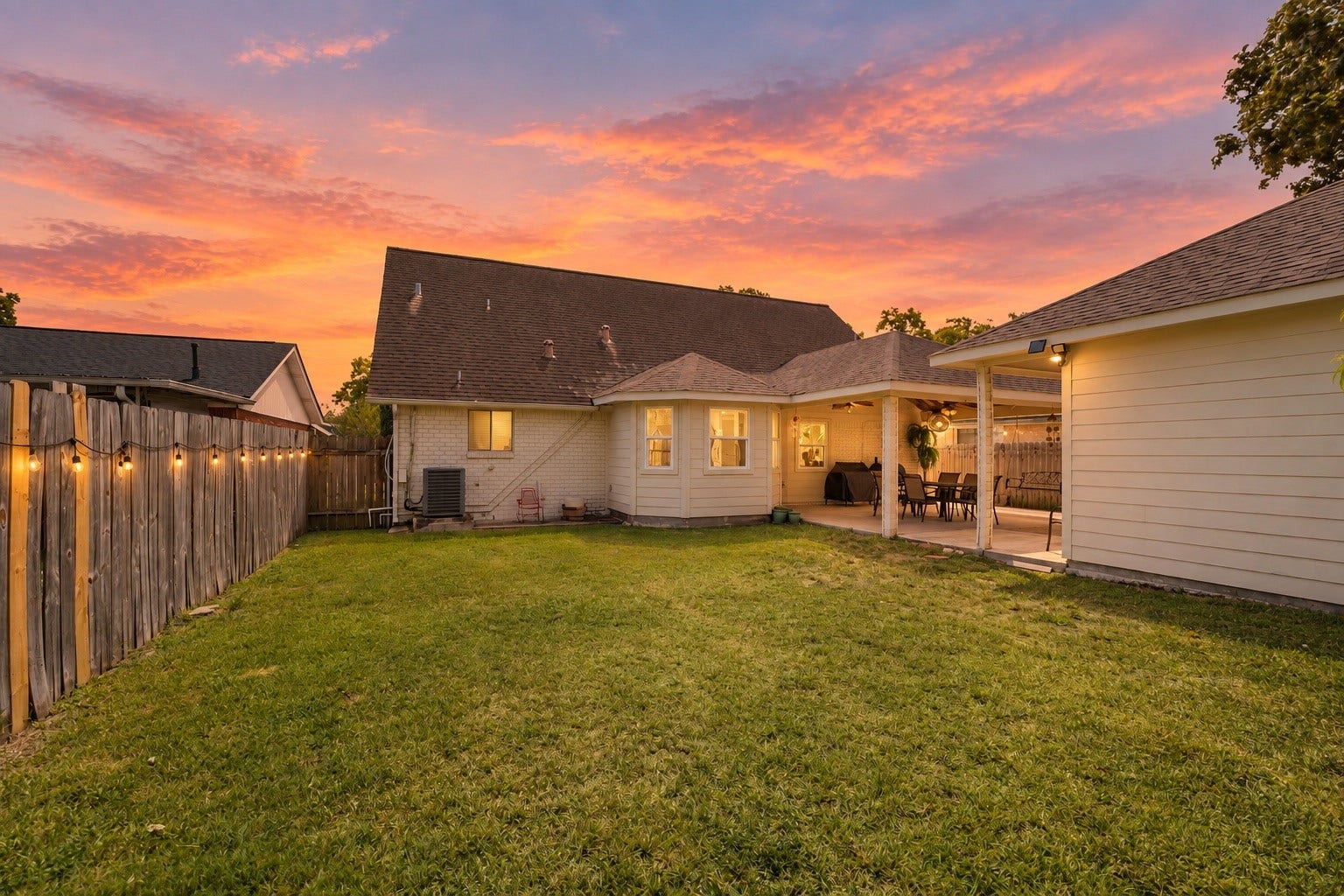 2603 Grape Lane, Pasadena, TX 77502 View from backyard towards the home. (Sky Virtually Enhanced)