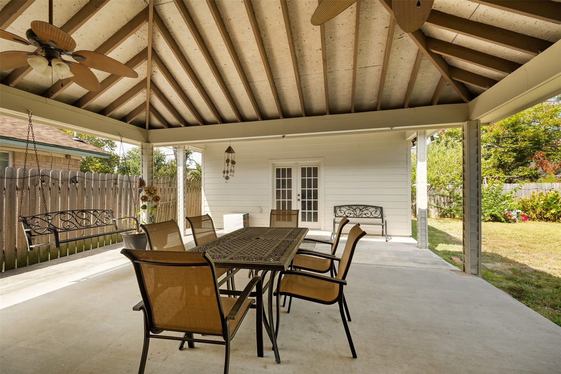2603 Grape Lane, Pasadena, TX 77502 Covered patio includes dual fans for hot summer days.