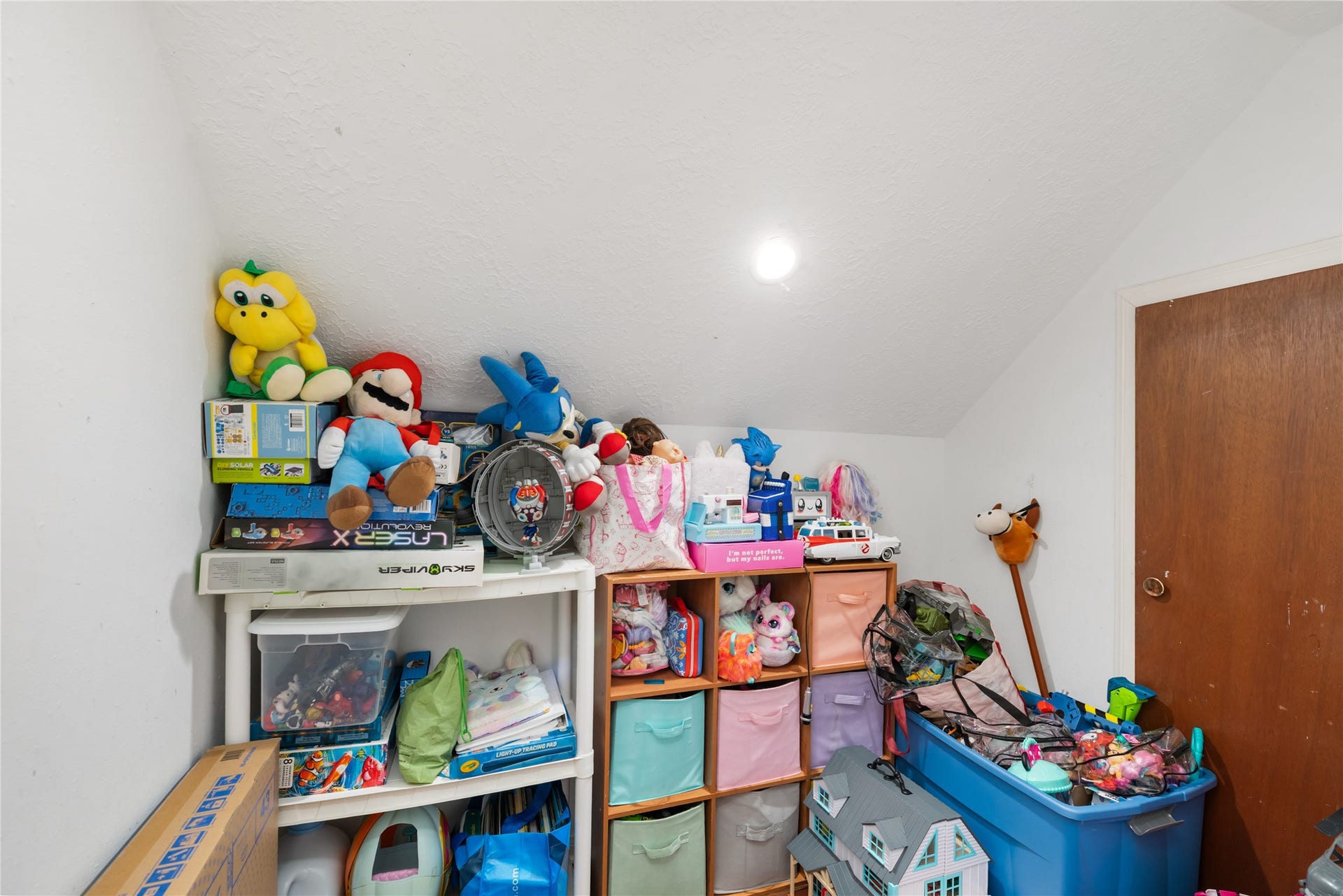 2603 Grape Lane, Pasadena, TX 77502 More added closet space added in attic area, perfect for holiday storage.