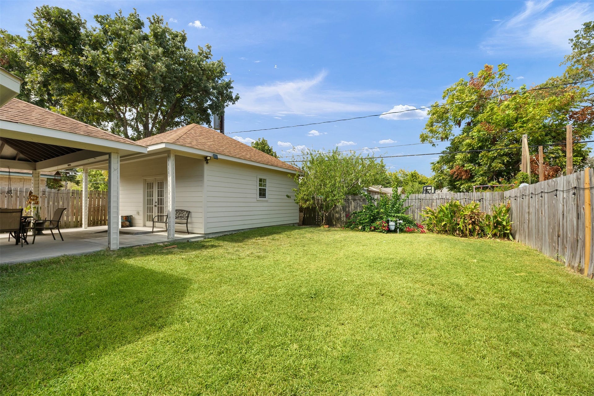 2603 Grape Lane, Pasadena, TX 77502 View from home to the backyard, covered patio and extra large flex room.