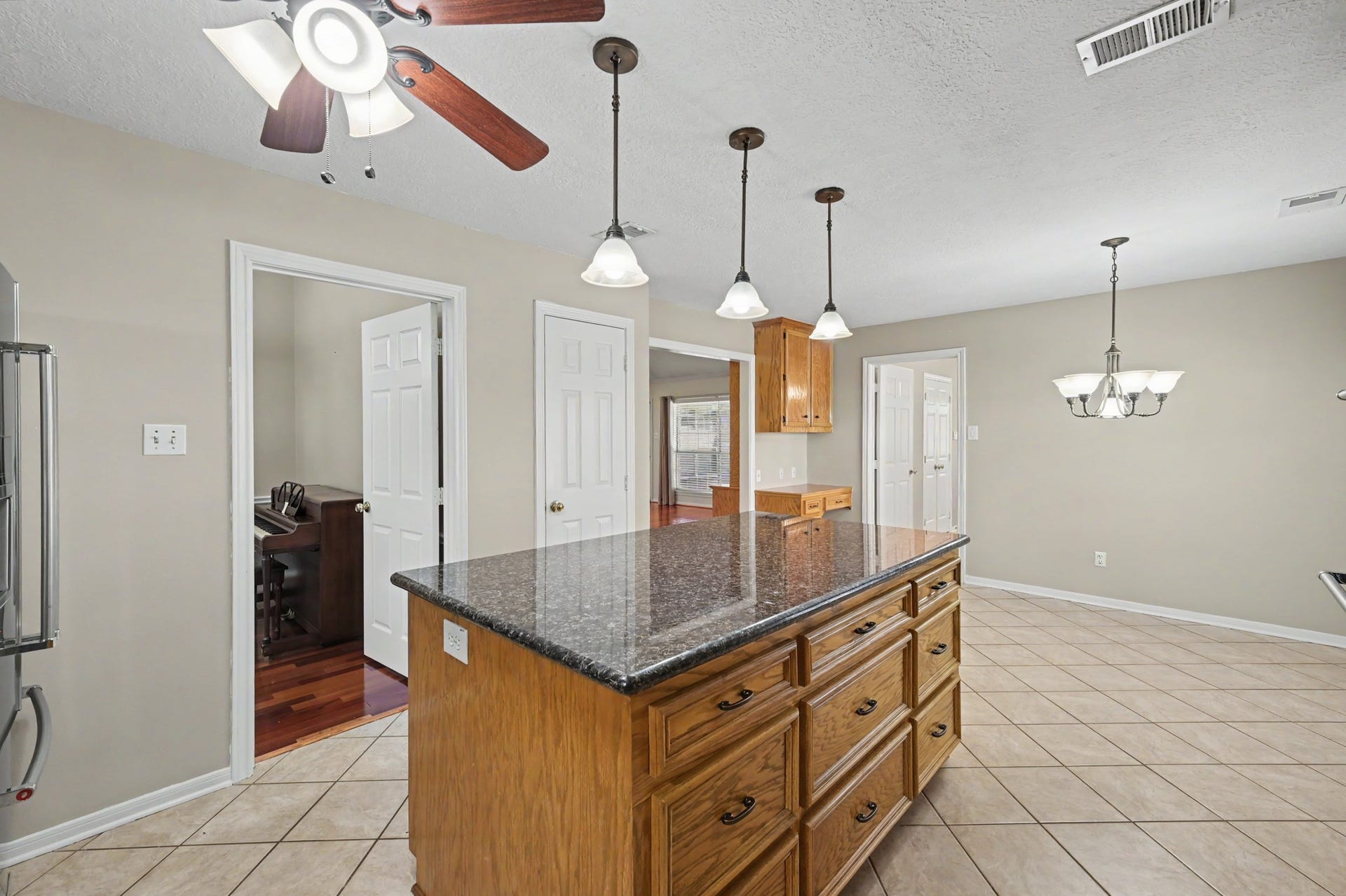 419 Dover Lane, Spring, TX 77373 Another view of the kitchen. Beyond, you can see the formal dining area as well as the living room.