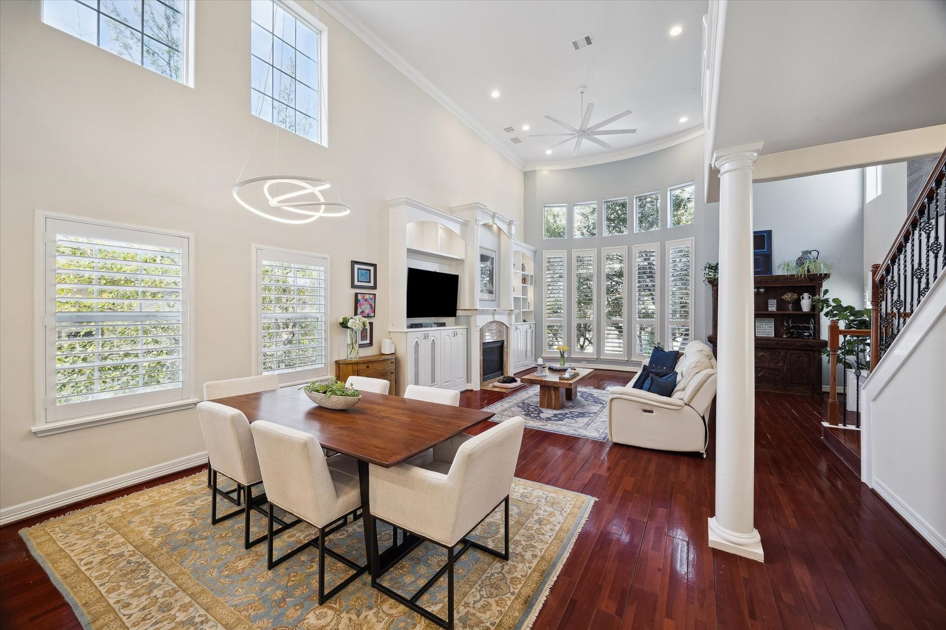 5717 Val Verde Street, #C, Houston, TX 77057 The dining room area is complemented by elegant finishes and hardwood floors, creating a warm and inviting atmosphere.