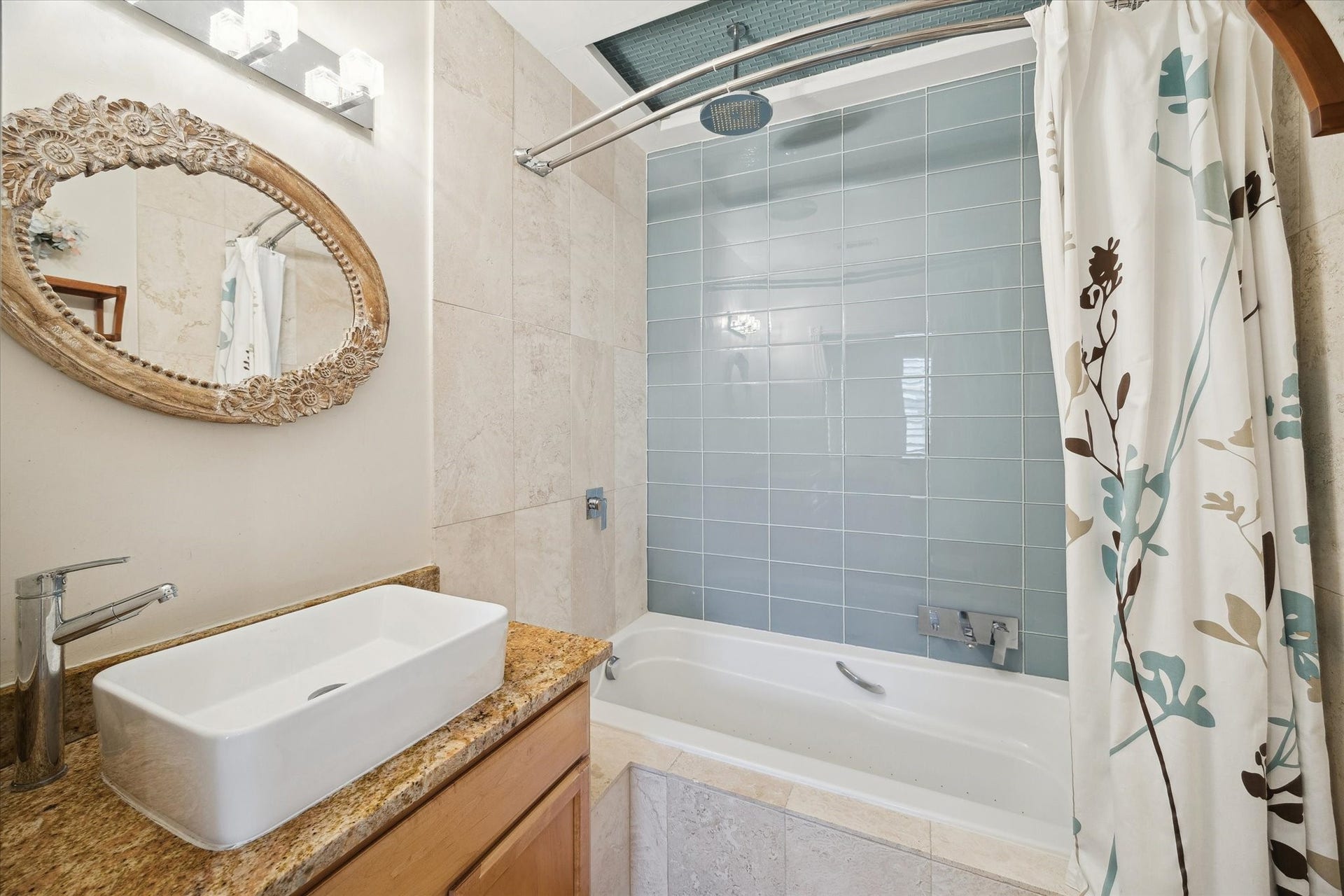 5717 Val Verde Street, #C, Houston, TX 77057 Secondary bathroom with modern design with a rectangular vessel sink, and a tub-shower combo with stylish blue-gray tile.