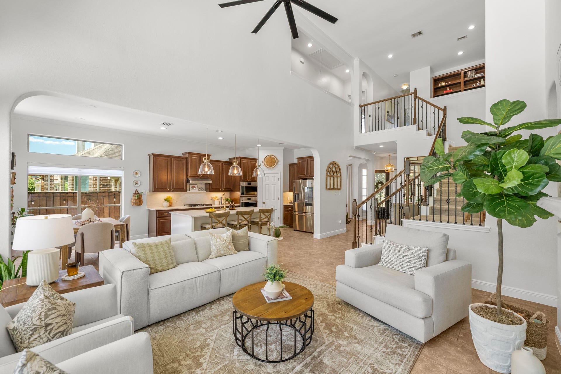 26 Winhall Place, The Woodlands, TX 77354 From quiet evenings at home to a house full of friends, the open living and kitchen areas make it easy to enjoy time together.