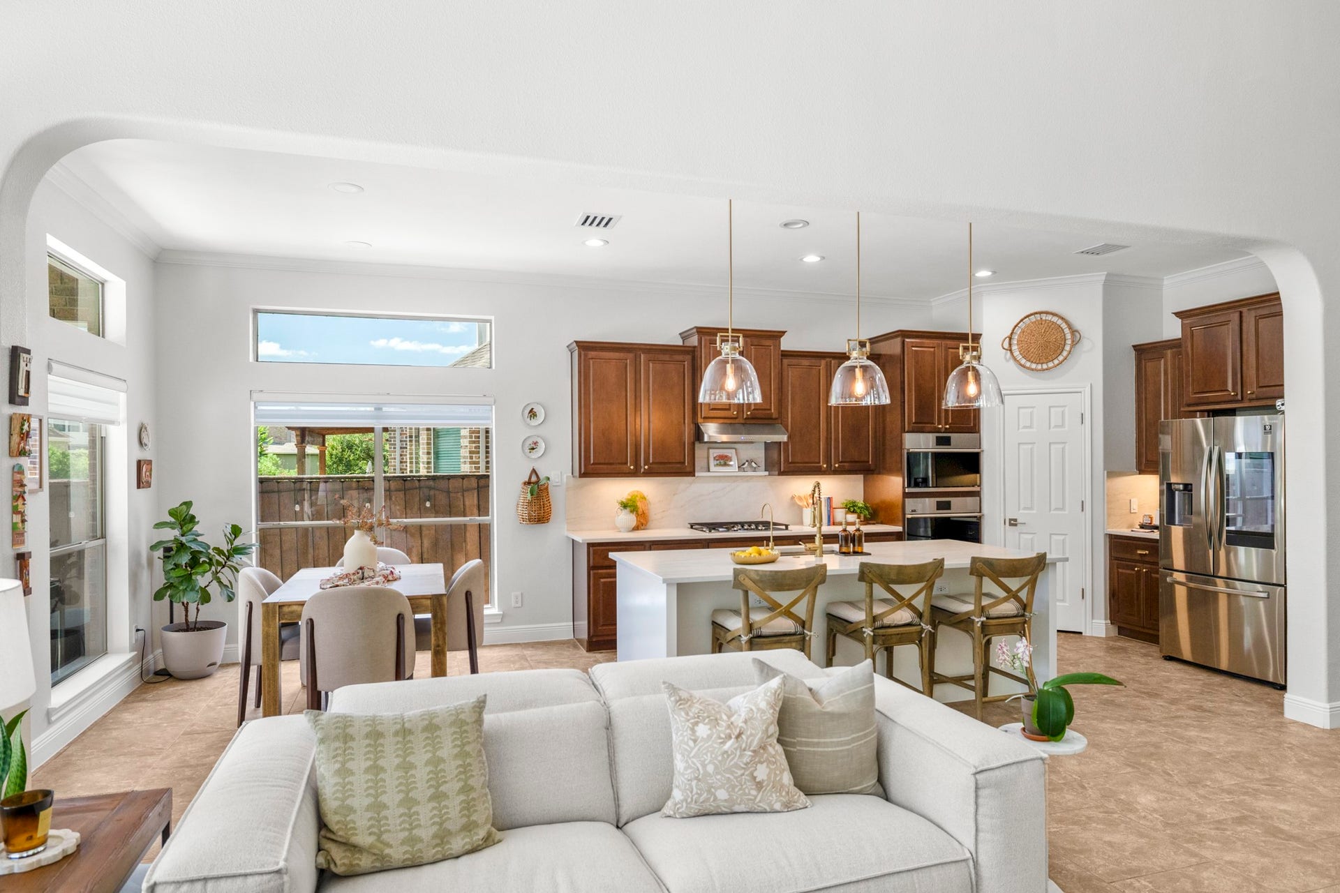 26 Winhall Place, The Woodlands, TX 77354 The open layout keeps everyone connected, whether you're preparing dinner in the kitchen or relaxing in the living room.