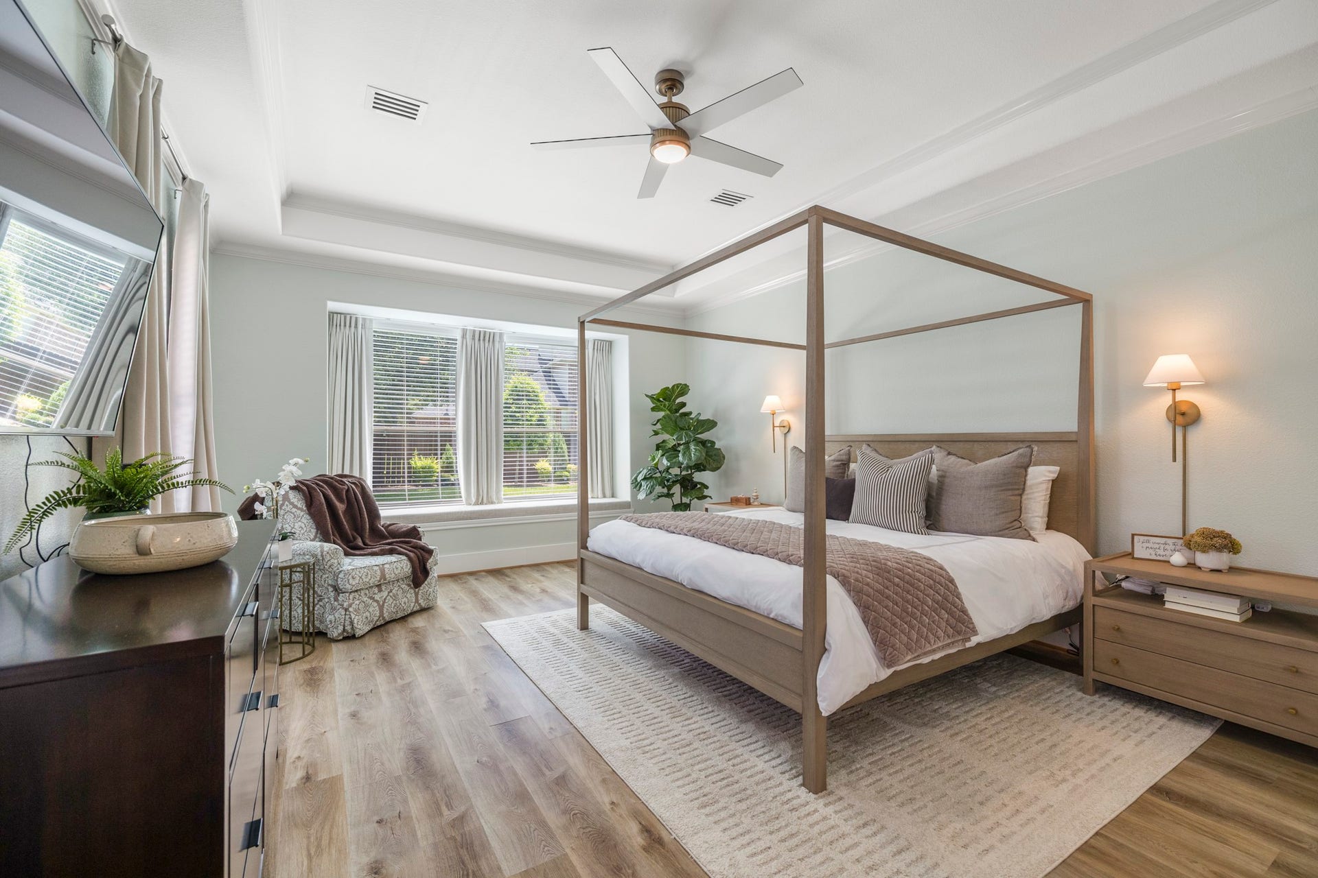 26 Winhall Place, The Woodlands, TX 77354 There is room to slow down here, with plenty of space for a sitting area, reading chair, or simply a quiet place to unwind.