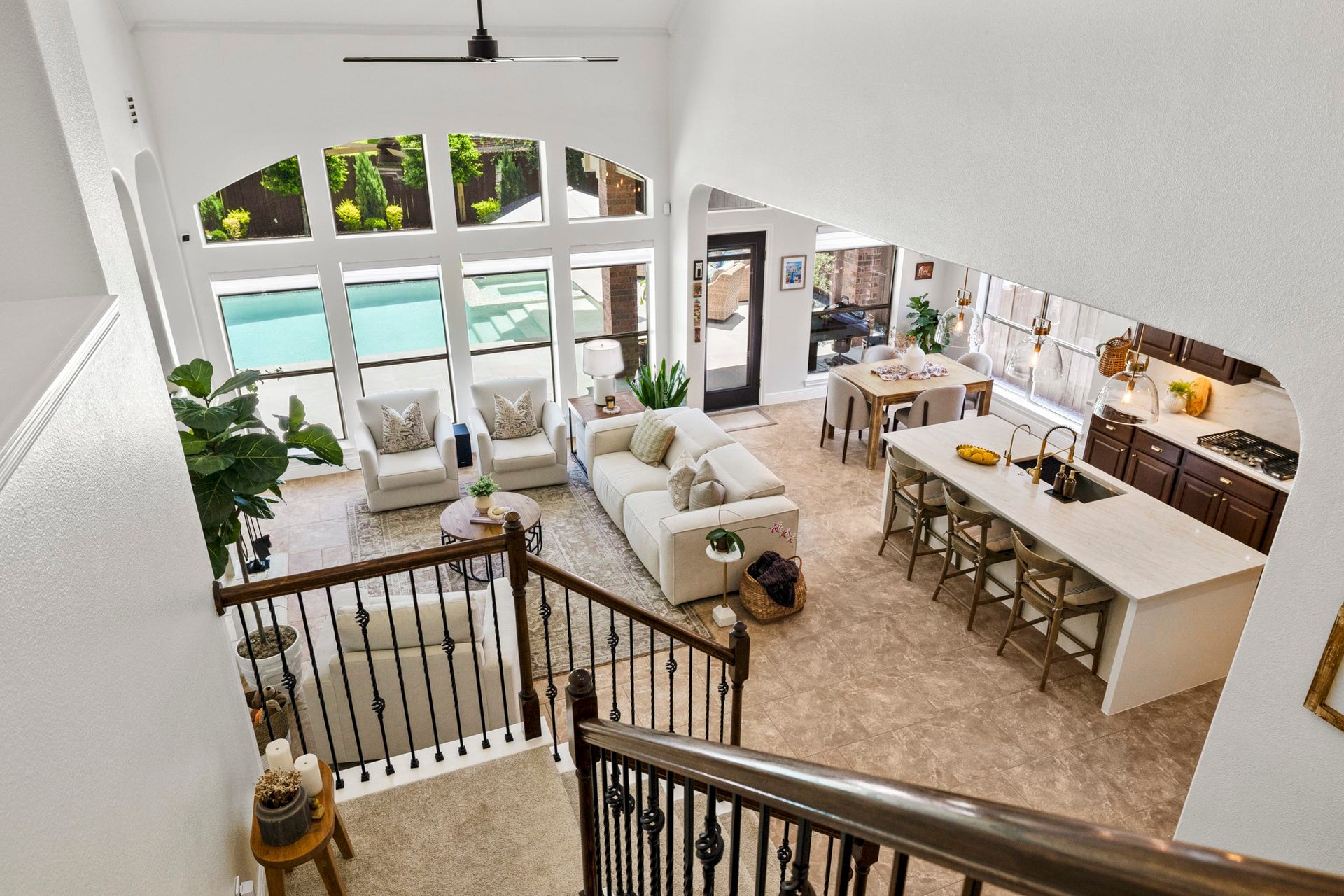 26 Winhall Place, The Woodlands, TX 77354 From upstairs, you get another look at just how open and connected this home feels, with natural light pouring in below.