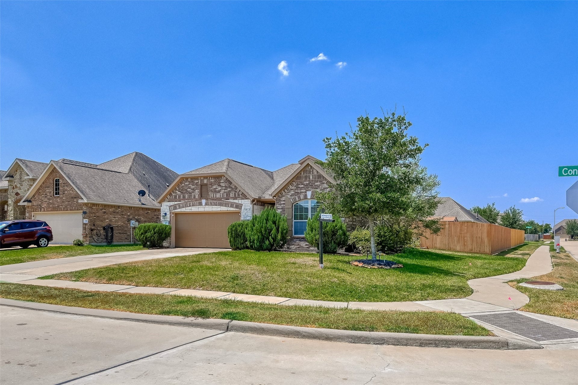 402 Conchola Lane, Richmond, TX 77469 Corner unit with a lake view right across.