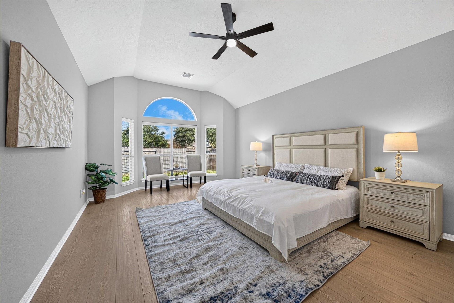 30 Palm Villas Drive, Manvel, TX 77578 Tucked away on the first floor, the primary bedroom is a serene sanctuary designed for pure rest and relaxation.