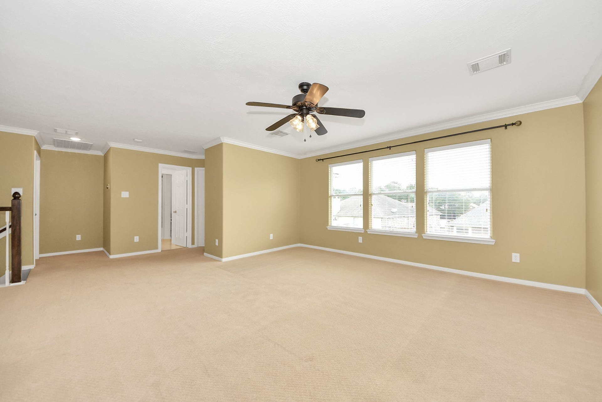 With its generous size, this upstairs gameroom creates endless possibilities for entertainment, a media space, play area, home gym, or the ultimate hangout spot.