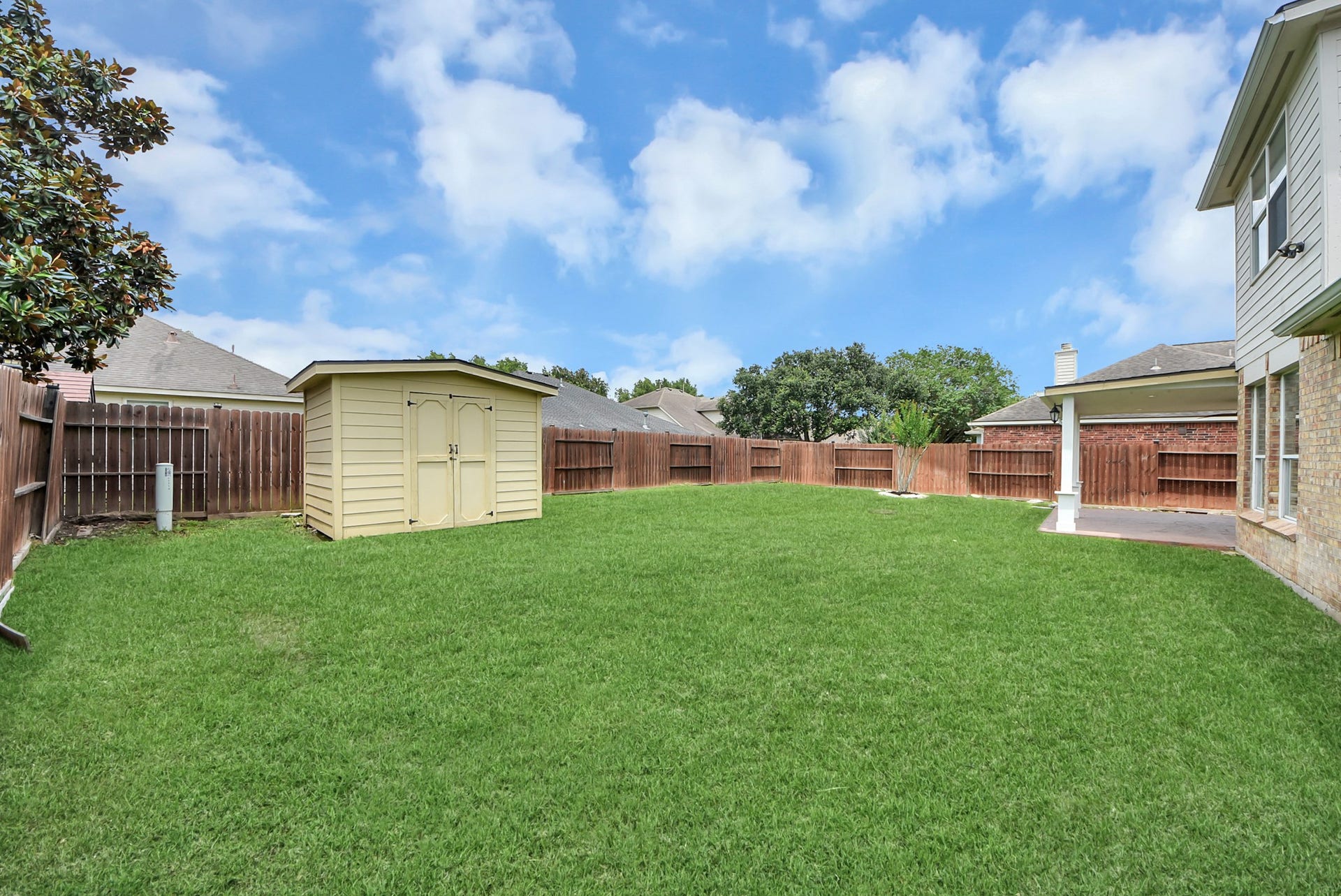Extra storage is always a welcome bonus! Tucked into the backyard, the storage shed provides convenient space for lawn equipment, gardening tools, seasonal dcor, and more.