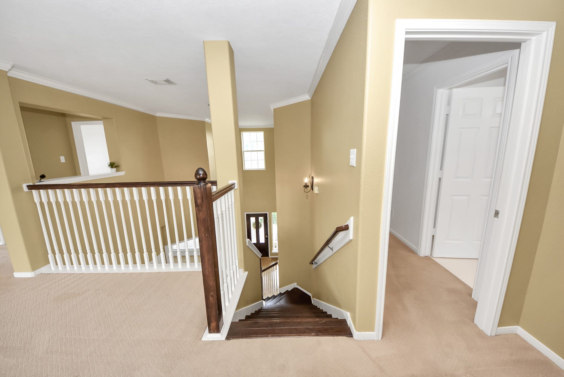 Head upstairs to discover a spacious second level featuring a huge gameroom and three additional bedrooms, each with access to a full bath for added comfort and convenience.