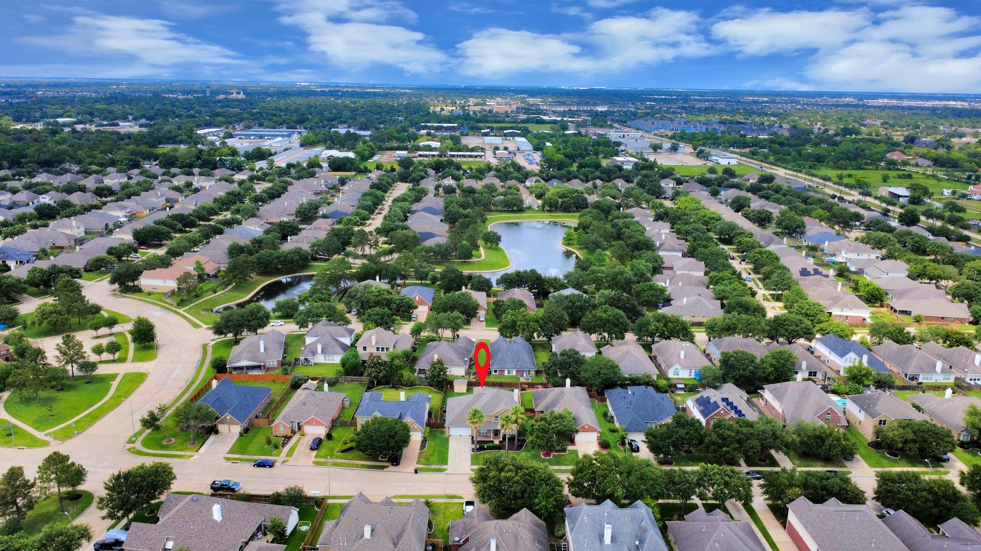 Take in the bird's-eye view of this beautifully maintained community, where manicured streetscapes and neighborhood charm create an inviting place to call home.