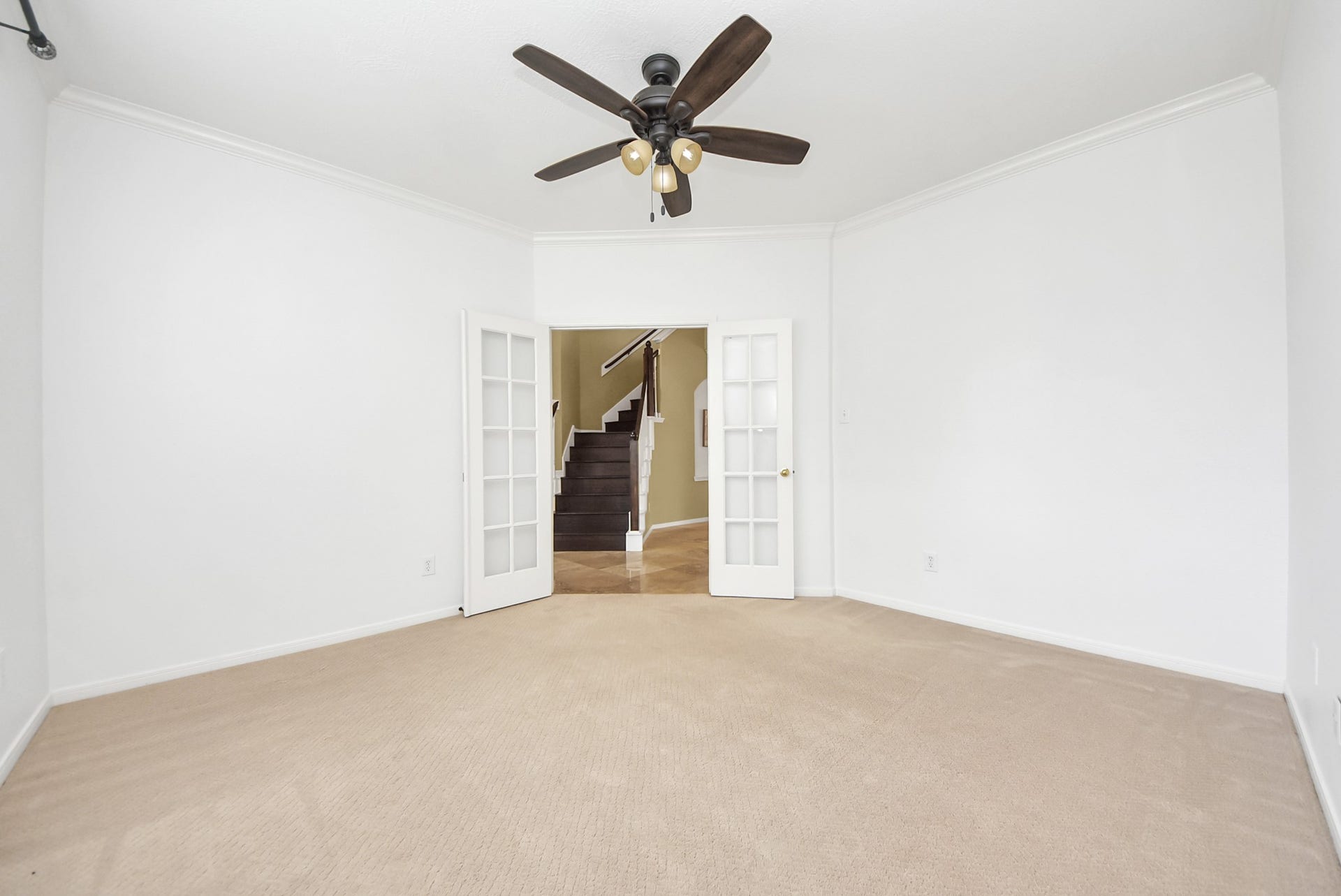 Flexibility meets functionality through the French doors in this versatile ground-floor space. Perfect as a home office, study, playroom, hobby room, or quiet retreat, it can easily adapt to your changing needs over time.