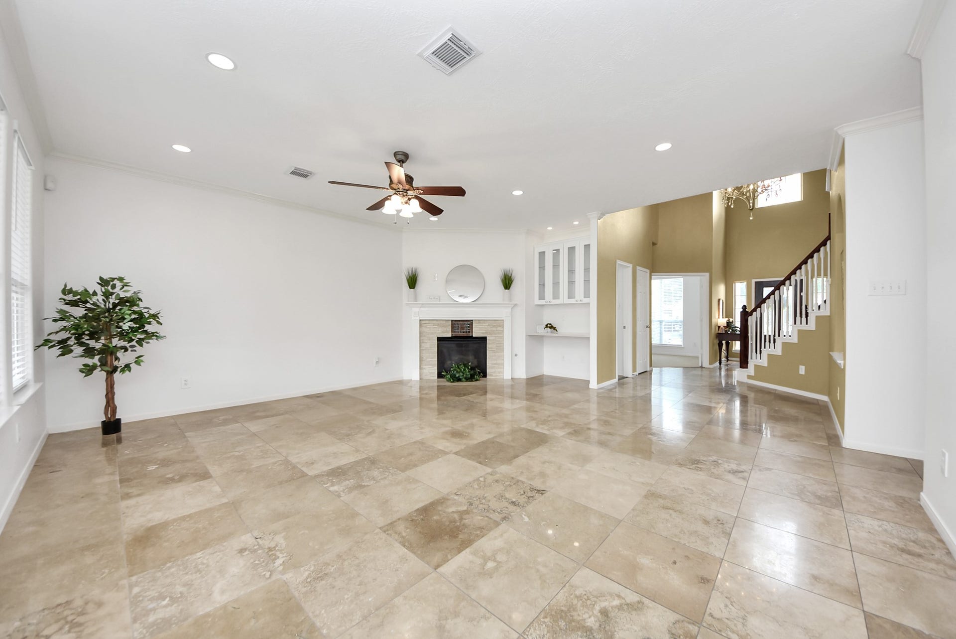 A gas log fireplace grounds the living room and offers a perfect focal point.