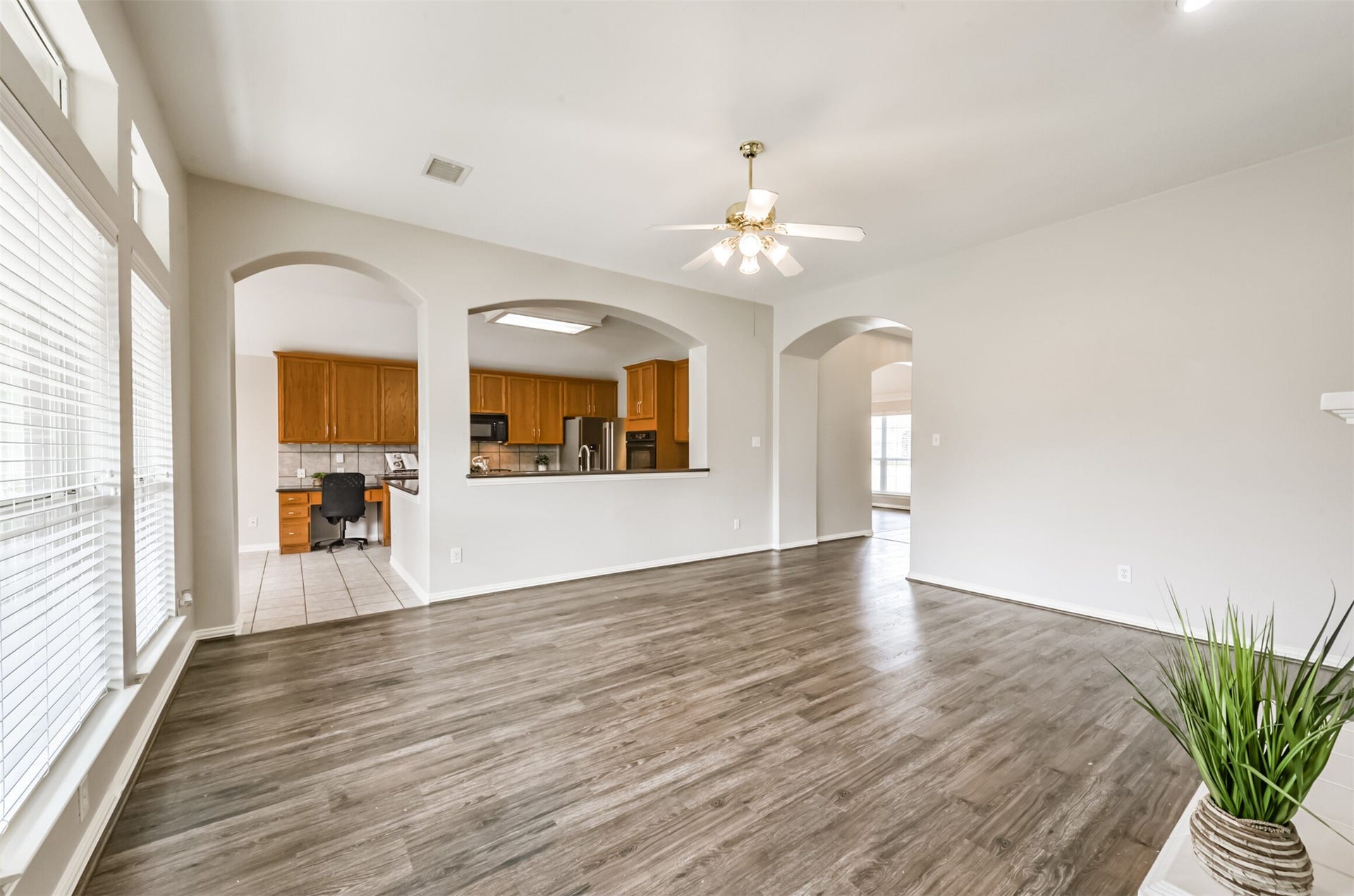2606 Clay Creek Court, Pearland, TX 77581 Den is open to kitchen.