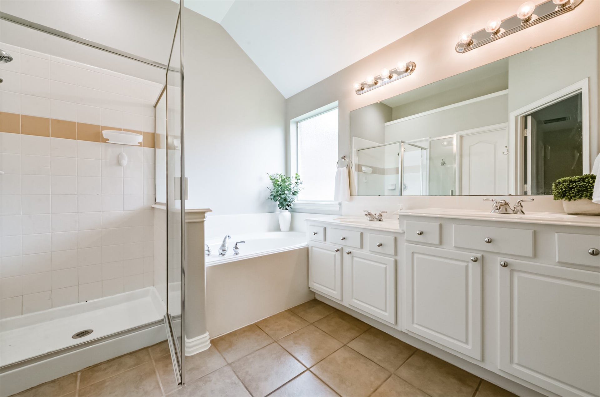 2606 Clay Creek Court, Pearland, TX 77581 Primary bath has tub, separate shower, and dual sinks.