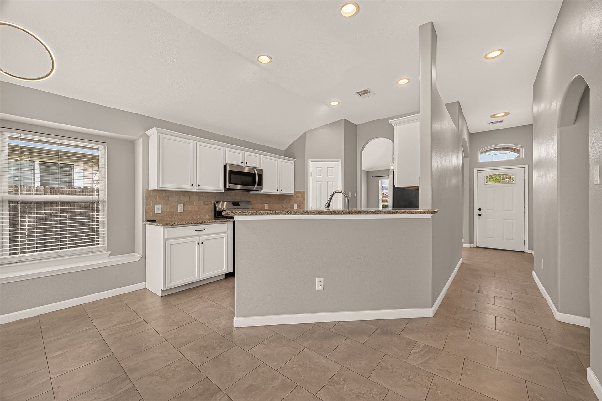 Bright and modern kitchen and a spacious breakfast bar.