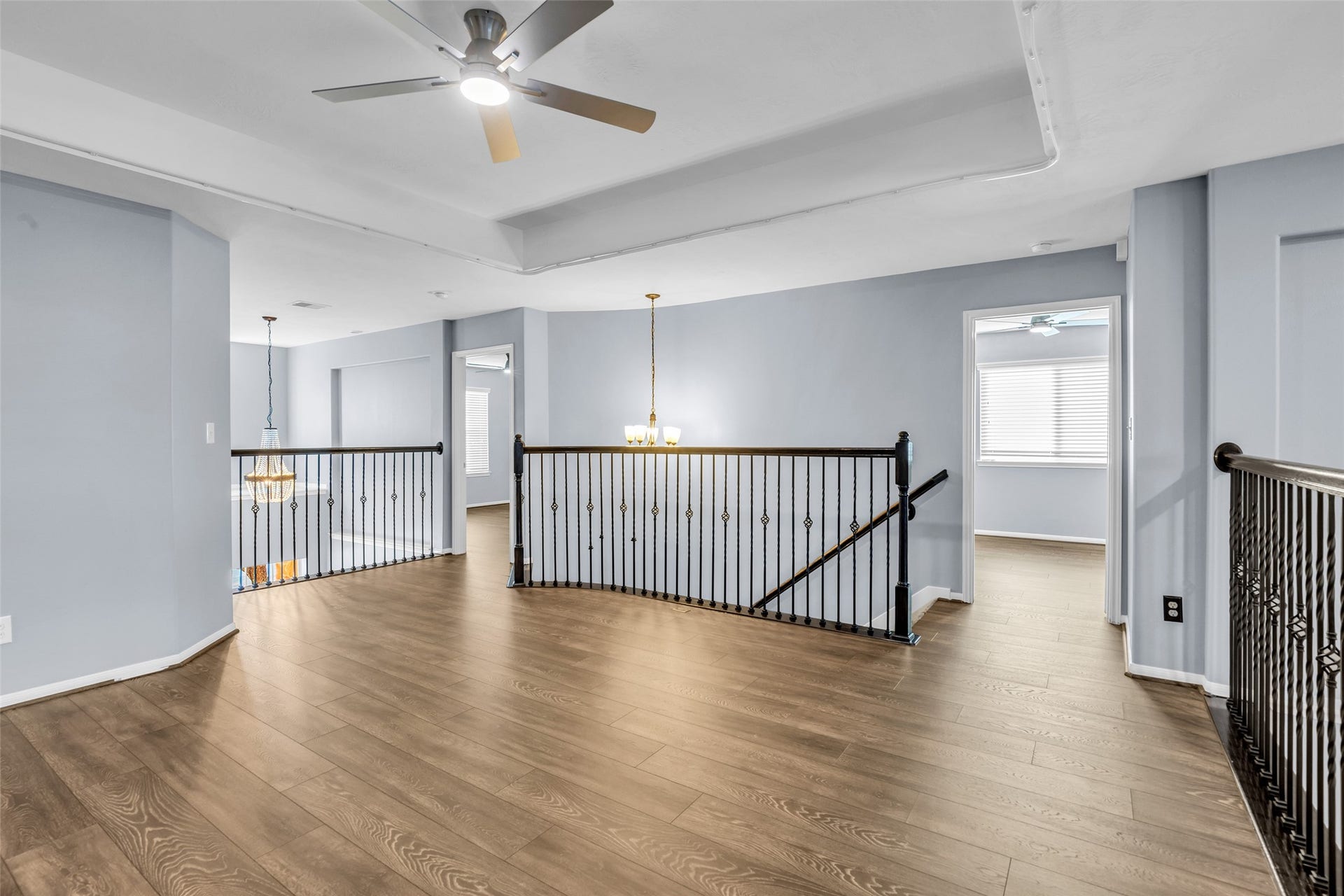 8121 Tranquil Lake Way, Conroe, TX 77385 Upstairs secondary bedroom. Total of 3 bedrooms upstairs.