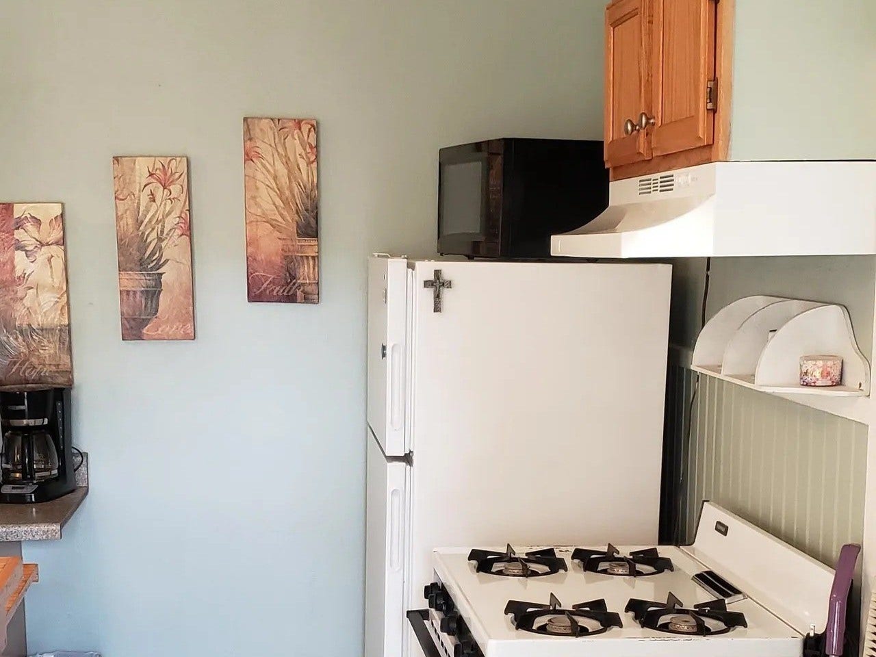 3709 Bayshore Drive, #1-12, Bacliff, TX 77518 Cozy kitchen in the Laurel Anne featuring charming decor, ample storage, and essential appliancesperfect for creating delicious meals in a welcoming space.