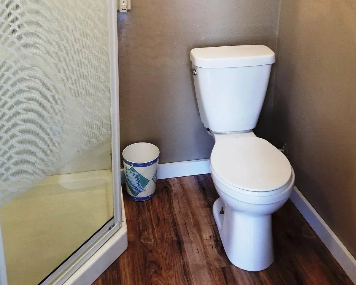3709 Bayshore Drive, #1-12, Bacliff, TX 77518 Compact and efficient bathroom in the Tackle Box featuring a modern shower and sleek design, perfect for maximizing space and functionality.