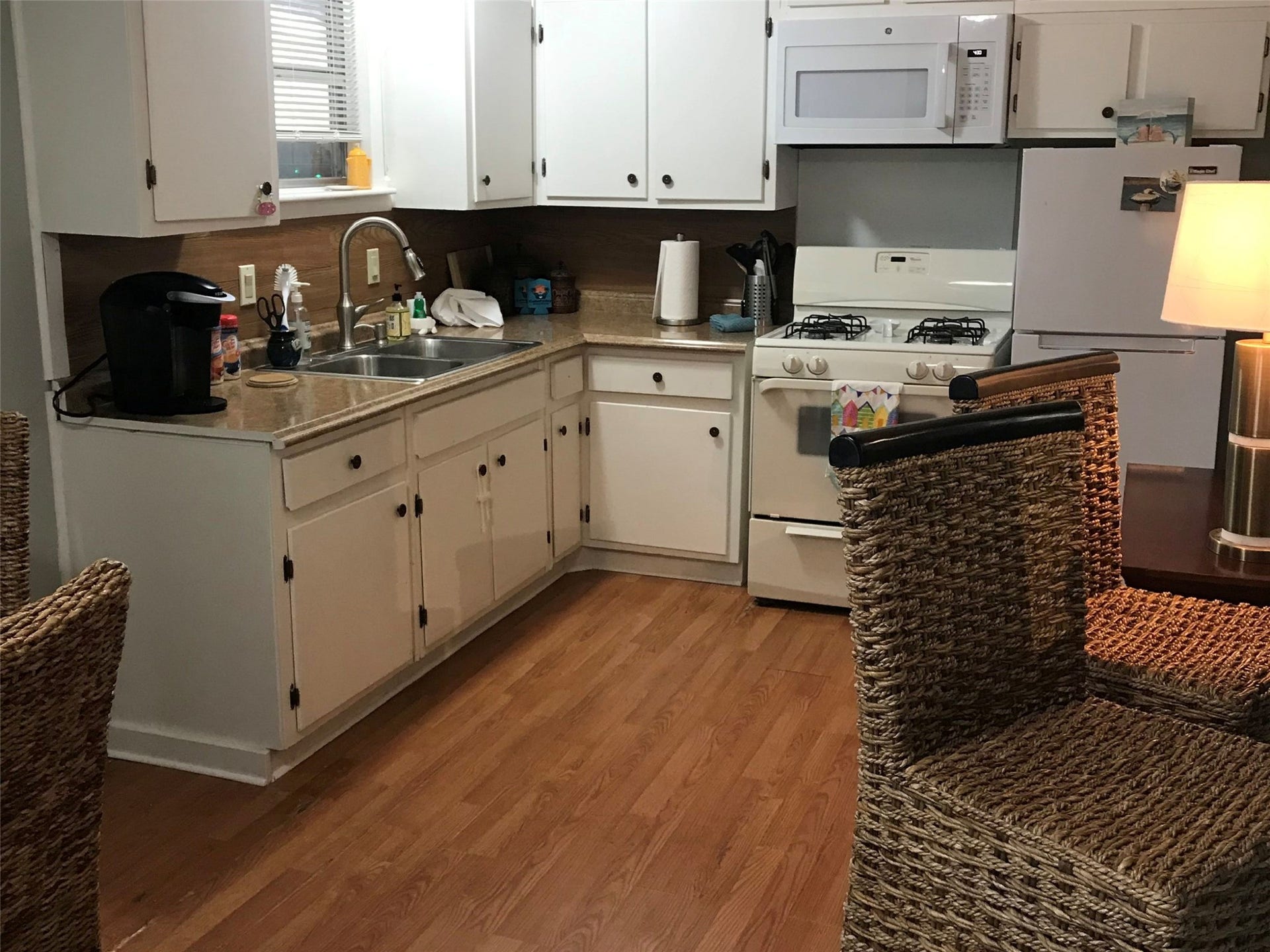 3709 Bayshore Drive, #1-12, Bacliff, TX 77518 Charming kitchen in Annie's Song with ample storage, modern appliances, and cozy dining spaceperfect for culinary creativity and intimate meals.