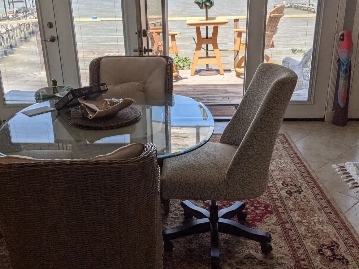 3709 Bayshore Drive, #1-12, Bacliff, TX 77518 Enjoy stunning bay views from the elegant Bay Room, featuring a cozy dining area with direct access to a charming deck.