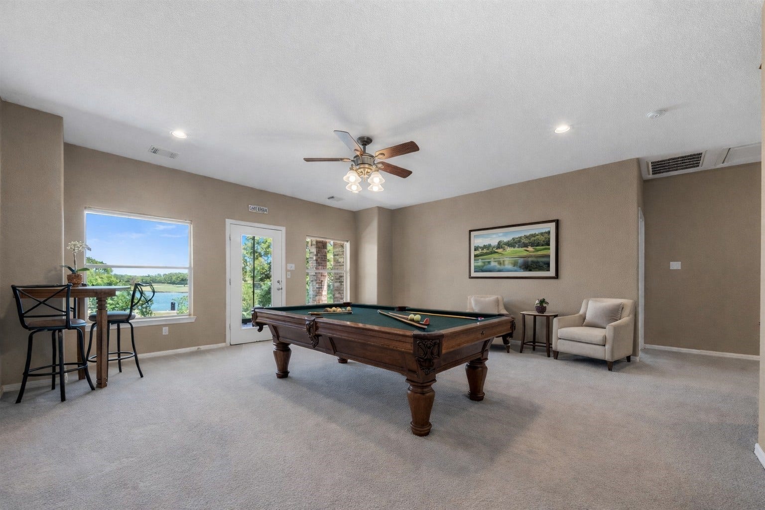 26418 Cottage Cypress Lane, Cypress, TX 77433 ***Virtually Staged***Spacious open-concept space featuring plush carpeting and large windows that provide abundant of natural light, creating a soft and inviting space to relax.