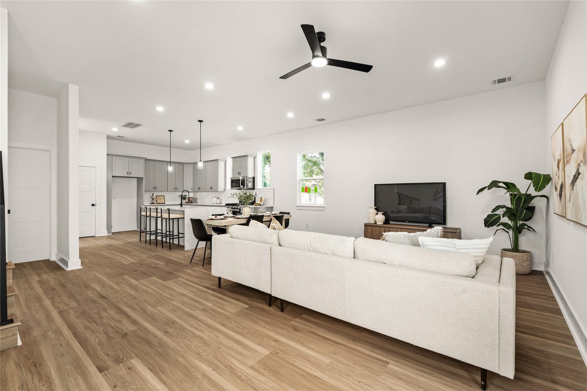 3412 Cortlandt Street, Houston, TX 77018 A sweeping view across the main level highlights the continuous flooring and open layout, so the living
room, dining area, and kitchen read as one cohesive, light-filled space.